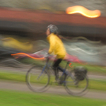 Bike rider in yellow jacket